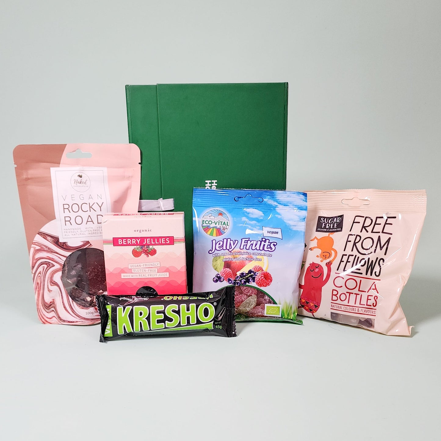 vegan lollies in front of a green hamper