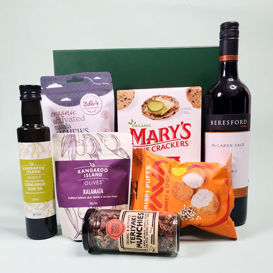 red wine and savoury items for a hamper