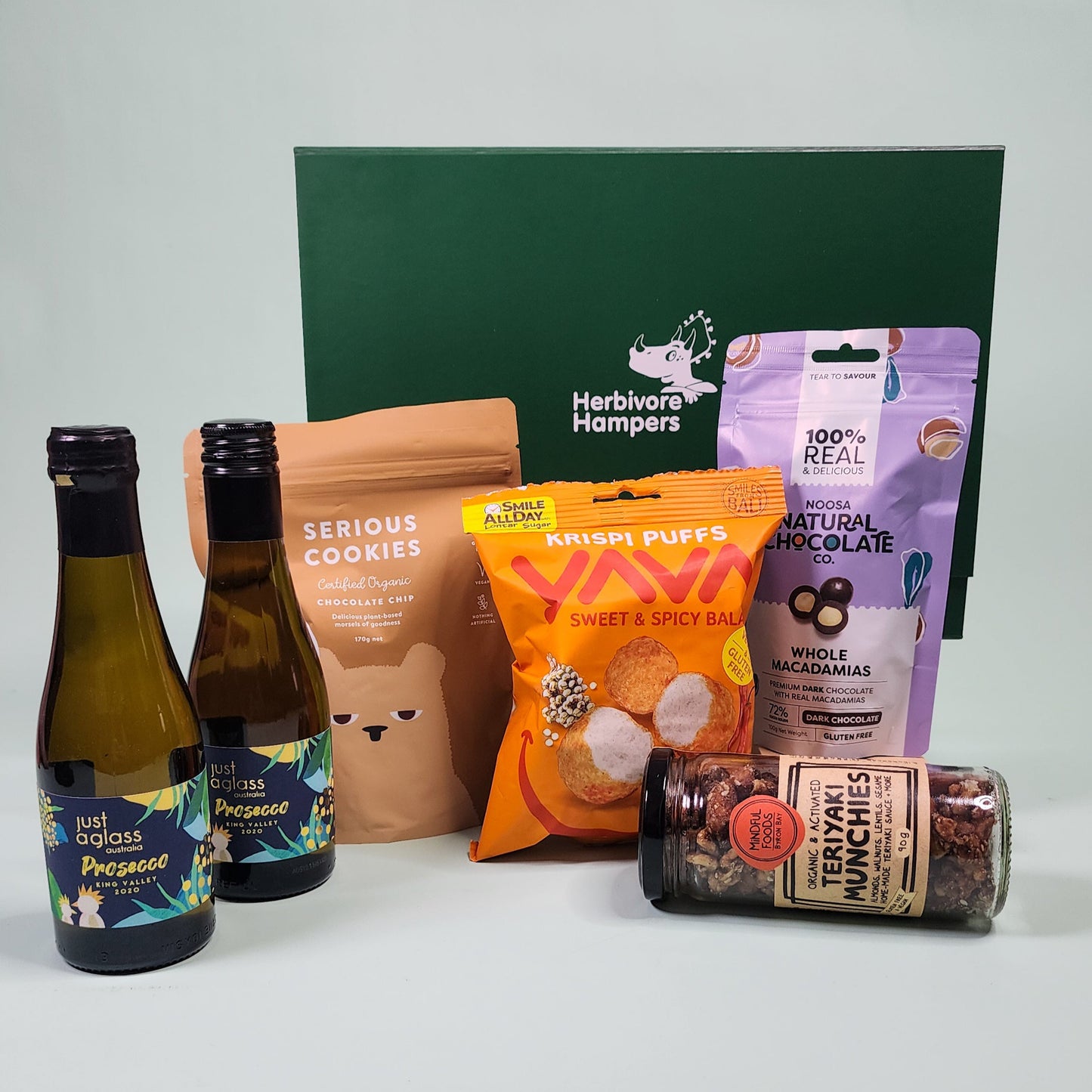 gourmet hamper items with a green hamper box
